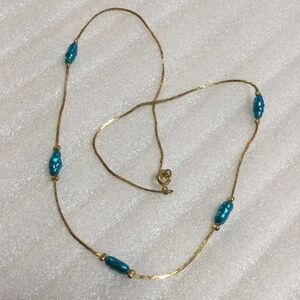 Elegant Gold and Blue Beaded Necklace